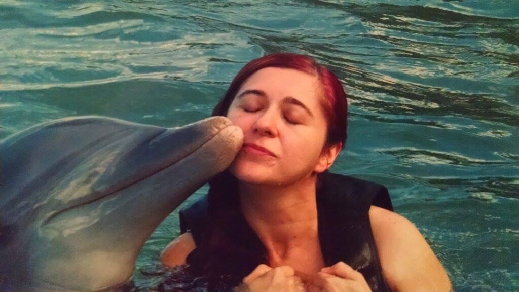 A bottlenose dolphin kissing me.